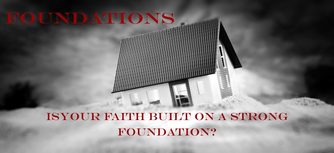 Miniature of house standing in sand